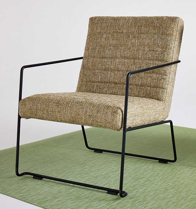 Two Muir chairs in fabric with black wire framework.